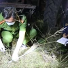 Lực lượng chức năng khám nghiệm hiện trường vụ hỗn chiến tranh chấp đất đai tại xã Ea Bung, huyện Ea Súp, Đắk Lắk. (Ảnh: Phạm Cường-Ngọc Hùng/TTXVN)