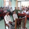 Hai nông dân tại phiên tòa sơ thẩm, (Ảnh: Nguyễn Thanh/TTXVN)