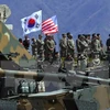 Binh sỹ Hàn Quốc và Mỹ trong cuộc tập trận chung tại Pocheon, cách thủ đô Seoul của Hàn Quốc 65km về phía Đông Bắc, ngày 26/4. (Nguồn: AFP/TTXVN) 