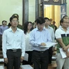 Các bị cáo nguyên là lãnh đạo Navibank hầu tòa sáng 28/2. (Ảnh: Thành Chung/TTXVN)