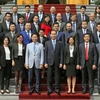Chủ tịch nước Trần Đại Quang với các đại biểu tham dự buổi gặp mặt. (Ảnh: Nhan Sáng/TTXVN)