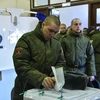 Cử tri Nga bỏ phiếu tại một điểm bầu cử ở thủ đô Moskva ngày 18/3. (Nguồn: AFP/TTXVN)