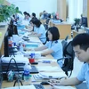 Khu vực tiếp nhận, giải quyết hồ sơ của doanh nghiệp tại Chi cục Hải quan cửa khẩu cảng Đình Vũ. (Ảnh: Minh Thu/TTXVN)