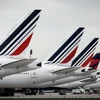 Nhân viên Hãng hàng không Air France tham gia đình công bên ngoài trụ sở ở Rossy, Pháp. (Nguồn: AFP/TTXVN)
