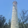 Ngọn tháp tre cao tới 20 mét với hàng nghìn chiếc bánh bao. (Ảnh: Mỹ Anh/Vietnam+)