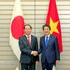 Chủ tịch nước Trần Đại Quang và Thủ tướng Nhật Bản Shinzo Abe tại buổi hội đàm. (Ảnh: Nhan Sáng/TTXVN)