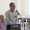 Bị cáo Đinh Mạnh Thắng nói lời cuối cùng trước khi tòa nghị án. (Ảnh: Dương Giang/TTXVN)