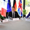 Thủ tướng Đức Merkel (trái), Tổng thống Pháp Macron (giữa) và Thủ tướng Anh Theresa May tại buổi họp. (Nguồn: EPA)