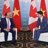 Thủ tướng Nguyễn Xuân Phúc và Thủ tướng Canada Justin Trudeau hội đàm hẹp. (Ảnh: Thống Nhất/TTXVN)