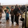 Người dân Syria phải rời bỏ nhà cửa đi lánh nạn. (Nguồn: AFP/TTXVN)