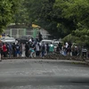 Người biểu tình dựng rào chắn tại Managua, Nicaragua ngày 11/6. (Nguồn: EPA/TTXVN)
