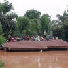Cảnh ngập lụt sau khi đập thủy điện tại tỉnh Attapeu, Lào bị vỡ. (Nguồn: EPA/TTXVN)