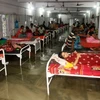 Ngập lụt tại một bệnh viện ở Patna, bang Bihar, Ấn Độ ngày 28/7. (Nguồn: AFP/ TTXVN)