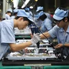Công nhân tại một nhà máy ở Trung Quốc. (Nguồn: China 2 West)