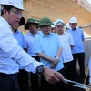 Bộ trưởng Bộ Giao thông Vận tải Nguyễn văn Thể kiểm tra dự án đường cao tốc Đà Nẵng-Quảng Ngãi. (Ảnh: Trần Tĩnh/TTXVN)