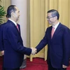 Chủ tịch nước Trần Đại Quang tiếp Chánh án Tòa án Nhân dân Tối cao Trung Quốc Chu Cường. (Ảnh: Nhan Sáng/TTXVN)