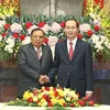 Chủ tịch nước Việt Nam Trần Đại Quang hội kiến Tổng Bí thư, Chủ tịch nước Lào Bounnhang Vorachith thăm hữu nghị chính thức Việt Nam tháng 12/2017. (Ảnh: Nhan Sáng/TTXVN)