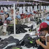 Sản xuất hàng dệt may xuất khẩu tại Việt Nam. (Nguồn: TTXVN)