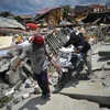 Cảnh đổ nát sau vụ động đất và sóng thần tại Balaroa, Palu, Trung Sulawesi, Indonesia. (Ảnh: THX/TTXVN)