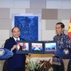 Thủ tướng Nguyễn Xuân Phúc hội đàm với Tổng thống Cộng hòa Indonesia Joko Widodo. (Ảnh: Thống Nhất/TTXVN)