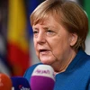 Thủ tướng Đức Angela Merkel trả lời báo giới khi tới Brussels, Bỉ. (Nguồn: AFP/TTXVN)