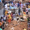 Tìm kiếm người mất tích trong vụ sạt lở đất tại khu vực Niteroi, bang Rio de Janerio, Brazil. (Nguồn: EPA)