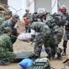 Lực lượng quân đội Việt Nam và Trung Quốc tham gia diễn tập liên hợp cứu nạn thảm họa, dịch bệnh khu vực biên giới Việt Nam-Trung Quốc. (Ảnh: Dương Giang/TTXVN)