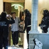 Cảnh sát Italy tại biệt thự của một thành viên băng nhóm mafia. (Nguồn: BBC)
