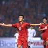 Phan Văn Đức (số 20) ăn mừng sau khi ghi bàn thắng nâng tỷ số lên 3-0 cho đội tuyển Việt Nam. (Ảnh: Trọng Đạt/TTXVN)