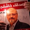 Thắp nến nguyện cầu cho nhà báo Khashoggi (Nguồn: AFP)