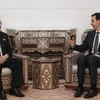 Ngoại trưởng Triều Tiên Ri Yong-ho (trái) và Tổng thống Syria Bashar al-Assad. (Nguồn: AP)