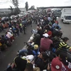 Người di cư Trung Mỹ tại khu vực ngoại ô Mexico City, Mexico, trong hành trình tới Mỹ ngày 10/11/2018. (Ảnh: AFP/TTXVN)