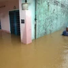 Một nhà dân ở phường Hòa Khánh Nam, quận Liên Chiểu ngập chìm trong nước. (Ảnh: Trần Lê Lâm/TTXVN)