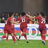 Pha ăn mừng bàn thắng vào lưới Malaysia của các cầu thủ Việt Nam trong trận lượt đi chung kết AFF Suzuki Cup 2018, Kuala Lumpur, Malaysia ngày 11/12/2018. (Ảnh: AFP/TTXVN)