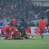 Các cầu thủ Việt Nam ăn mừng sau khi trọng tài thổi còi kết thúc trận đấu. (Ảnh: Trọng Đạt/TTXVN)
