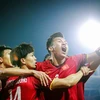 Tinh thần đoàn kết, kỷ luật và ý chí quật cường làm nên những thành công của đội tuyển Việt Nam ở sân chơi quốc tế. (Ảnh: Trọng Đạt/TTXVN)