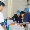 Bệnh nhân T. T.H đang được điều trị tại Bệnh viện Đa khoa Hùng Vương. (Ảnh: Trung Kiên/TTXVN)