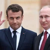 Tổng thống Nga Vladimir Putin và người đồng cấp Pháp Emmanuel Macron. (Nguồn: Daily Express)