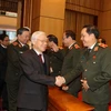 Tổng Bí thư, Chủ tịch nước Nguyễn Phú Trọng với các đại biểu dự hội nghị. (Ảnh: Trí Dũng/TTXVN)