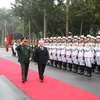 Tổng Bí thư, Chủ tịch nước Nguyễn Phú Trọng, Bí thư Quân ủy Trung ương duyệt đội danh dự Quân đội Nhân dân Việt Nam. (Ảnh: Trí Dũng/TTXVN)
