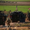 Đoàn xe của các lực lượng Mỹ được triển khai tại làng Yalanli, ngoại ô phía tây thành phố Manbij, Syria, ngày 5/3/2017. (Ảnh: AFP/ TTXVN)
