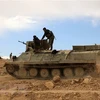 Lực lượng SDF được triển khai tại khu vực ngoại ô thị trấn al-Shadadi, tỉnh Hasakeh, đông bắc Syria. (Ảnh: AFP/TTXVN) 