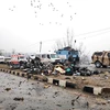 Hiện trường vụ đánh bom xe tại Kashmir ngày 14/2. (Nguồn: Reuters)