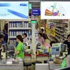 Người dân mua sắm tại một siêu thị ở Seoul của Hàn Quốc. (Ảnh: AFP/TTXVN)