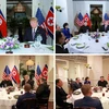 Báo Rodong Sinmun đăng phát các hình ảnh về Tổng thống Mỹ Donald Trump và Chủ tịch Triều Tiên Kim Jong-un dùng bữa tối thân mật. (Ảnh: Yonhap/TTXVN)