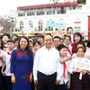 Thủ tướng Nguyễn Xuân Phúc dự Lễ phát động Năm an toàn cho phụ nữ và trẻ em. (Ảnh: Thống Nhất/TTXVN)