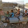 Trẻ em Syria tại trại tị nạn Ashari, khu vực Đông Ghouta. (Nguồn: AFP/TTXVN)