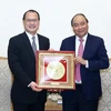 Thủ tướng Nguyễn Xuân Phúc tiếp ông Jonathan Choi, Chủ tịch Phòng Thương mại Hong Kong-Việt Nam. (Ảnh: Thống Nhất/TTXVN)