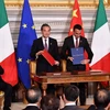 Lãnh đạo Trung Quốc và Italy chứng kiến lễ ký kết. (Nguồn: AFP)