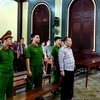 Bị cáo Huỳnh Ngọc Long nghe Tòa tuyên án. (Ảnh: Thành Chung/TTXVN)